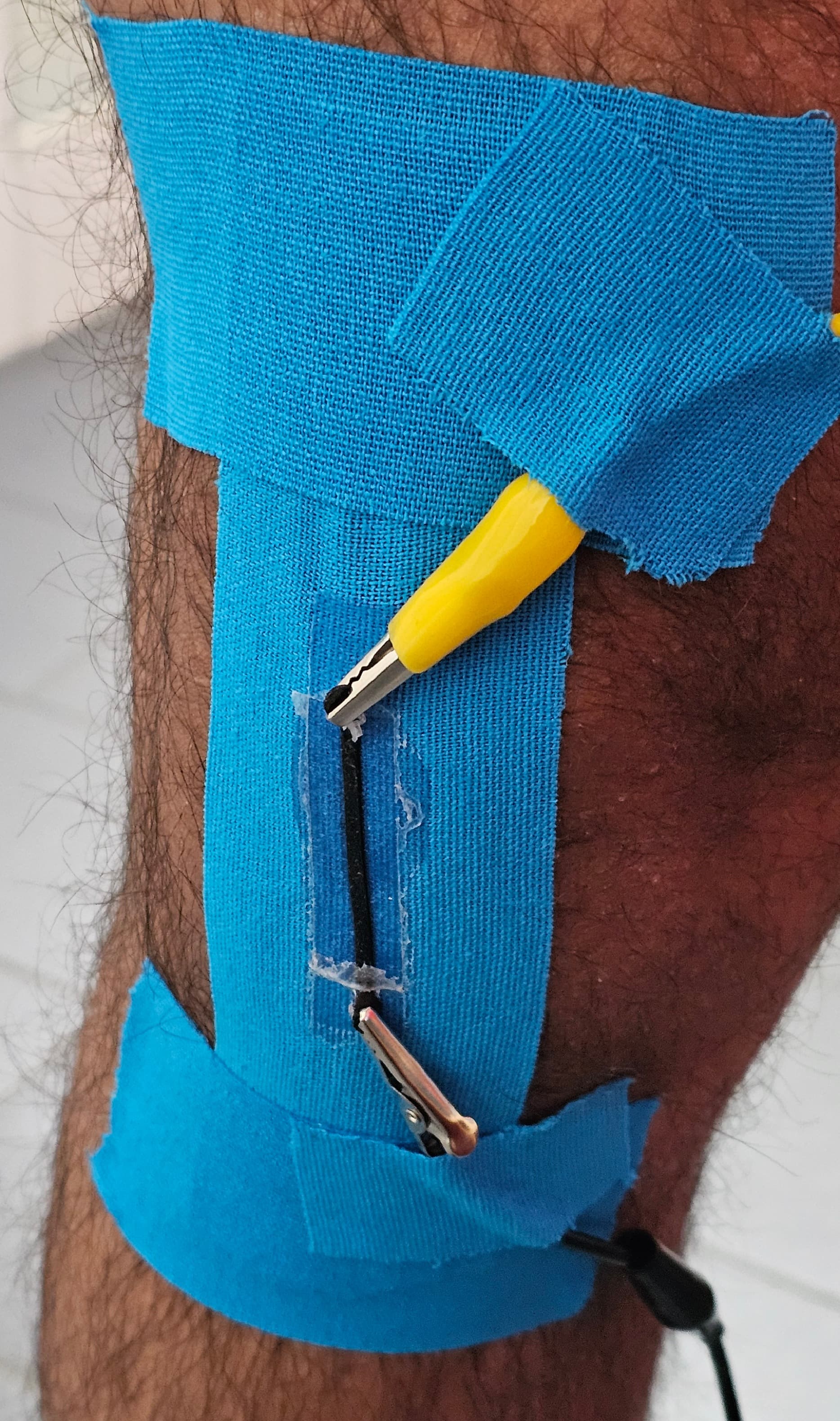 FDM printed sensor over knee applied using a kinesiology tape